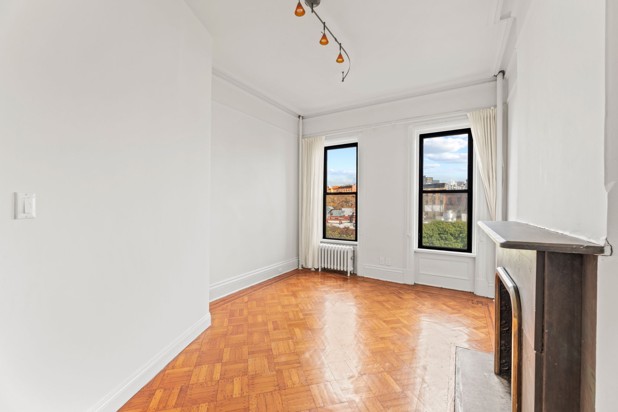 149 Sterling Place, Unit 3 Brooklyn, NY 11217 - Photo 3 of 9 a view of an empty room with a window