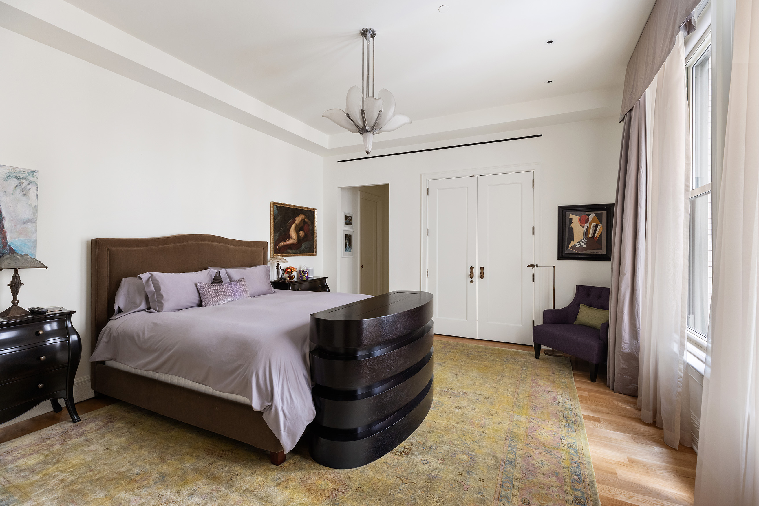 1 Central Park South, Unit 802 Manhattan, NY 10019 - Photo 2 of 16 a bedroom with a bed couch and a window