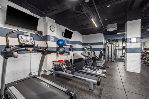 a view of a room with gym equipment
