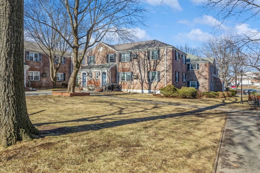 224-46 Horace Harding Expressway, Unit 630 Queens, NY 11364 - Photo 25 of 29 a view of a building with snow on the road