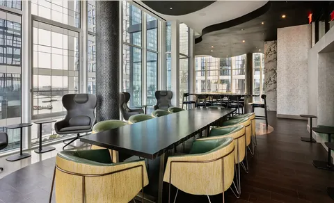 a outdoor living space with furniture and a potted plant