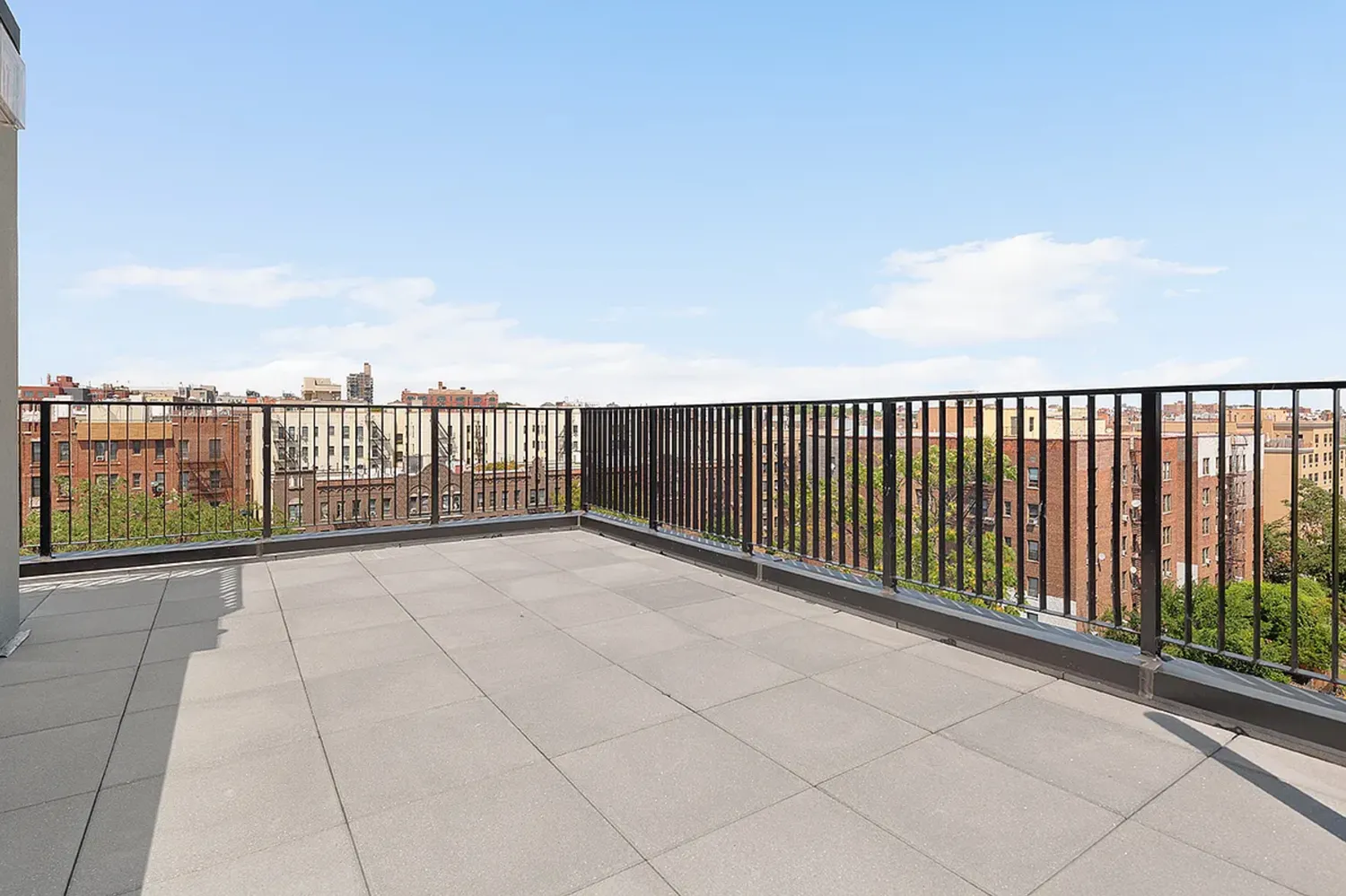 a view of a terrace with city view