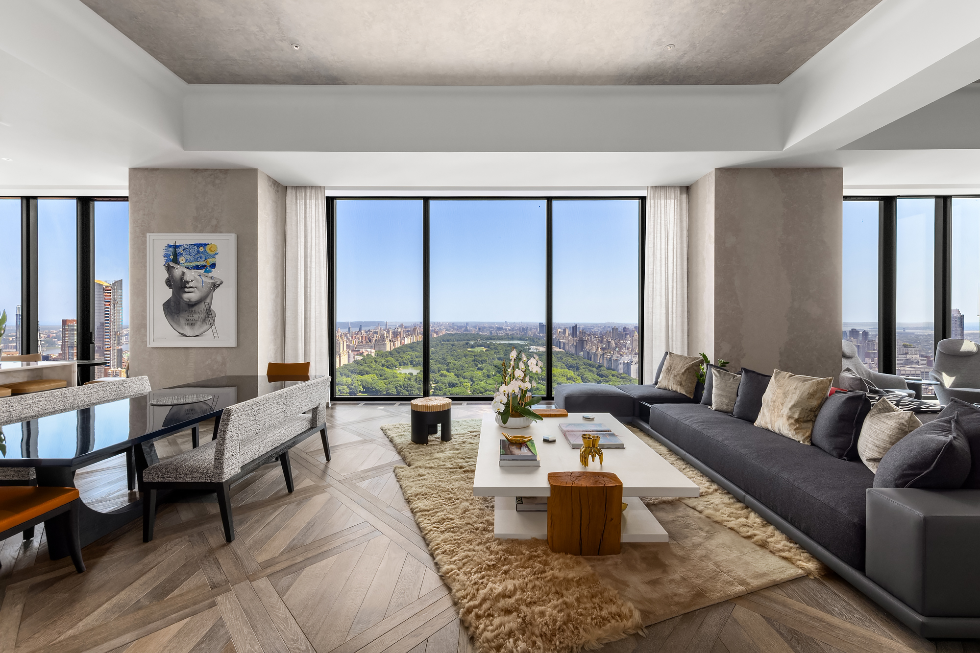 111 West 57th Street, Unit 46 Manhattan, NY 10019 - Photo 1 of 14 a living room with furniture and a large window