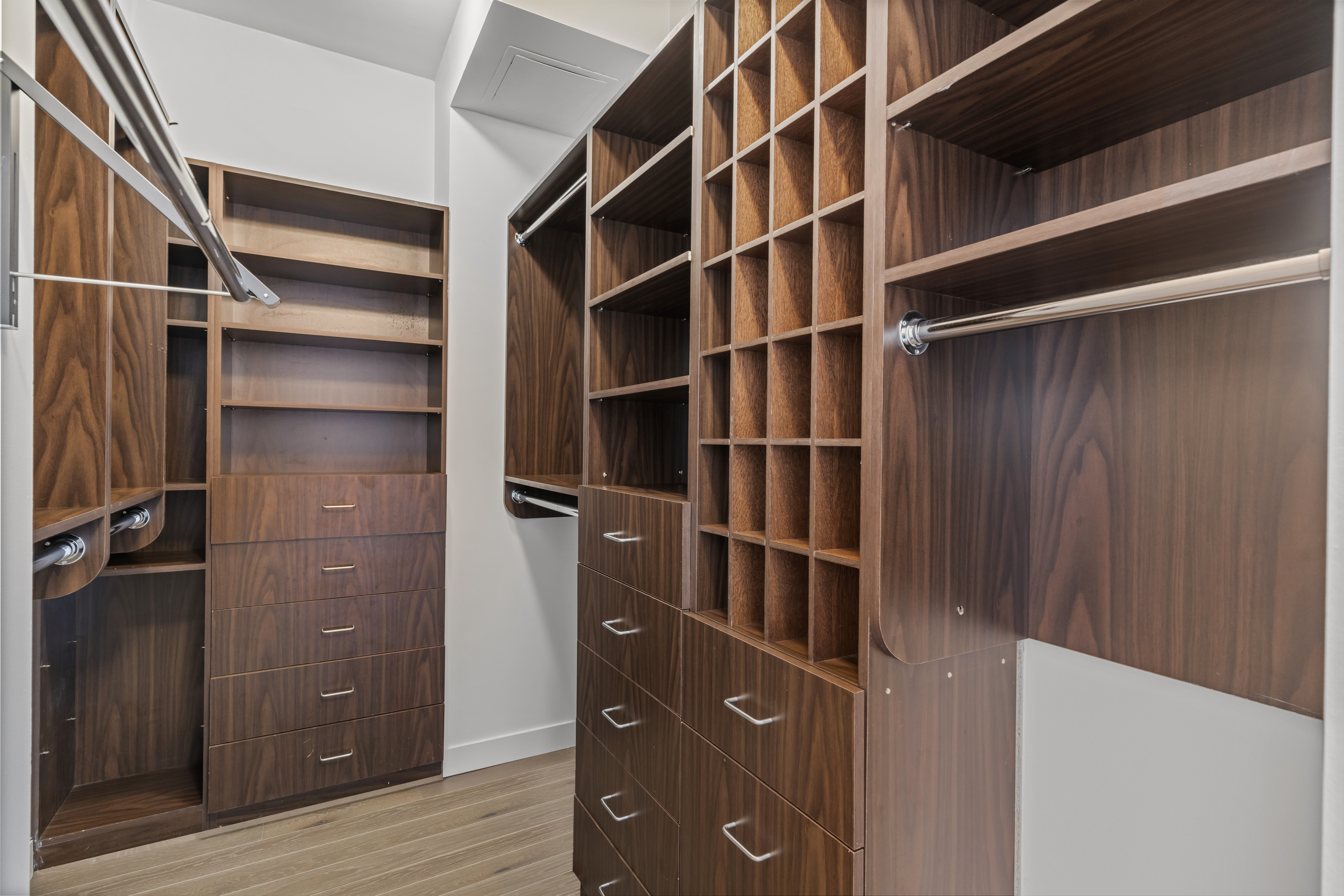 450 East 83rd Street, Unit 9E Manhattan, NY 10028 - Photo 13 of 18 a view of walk in closet with empty racks