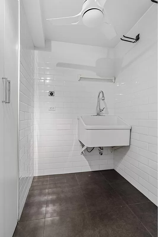 401 East 74th Street, Unit 20F Manhattan, NY 10021 - Photo 12 of 22 a bathroom with a sink