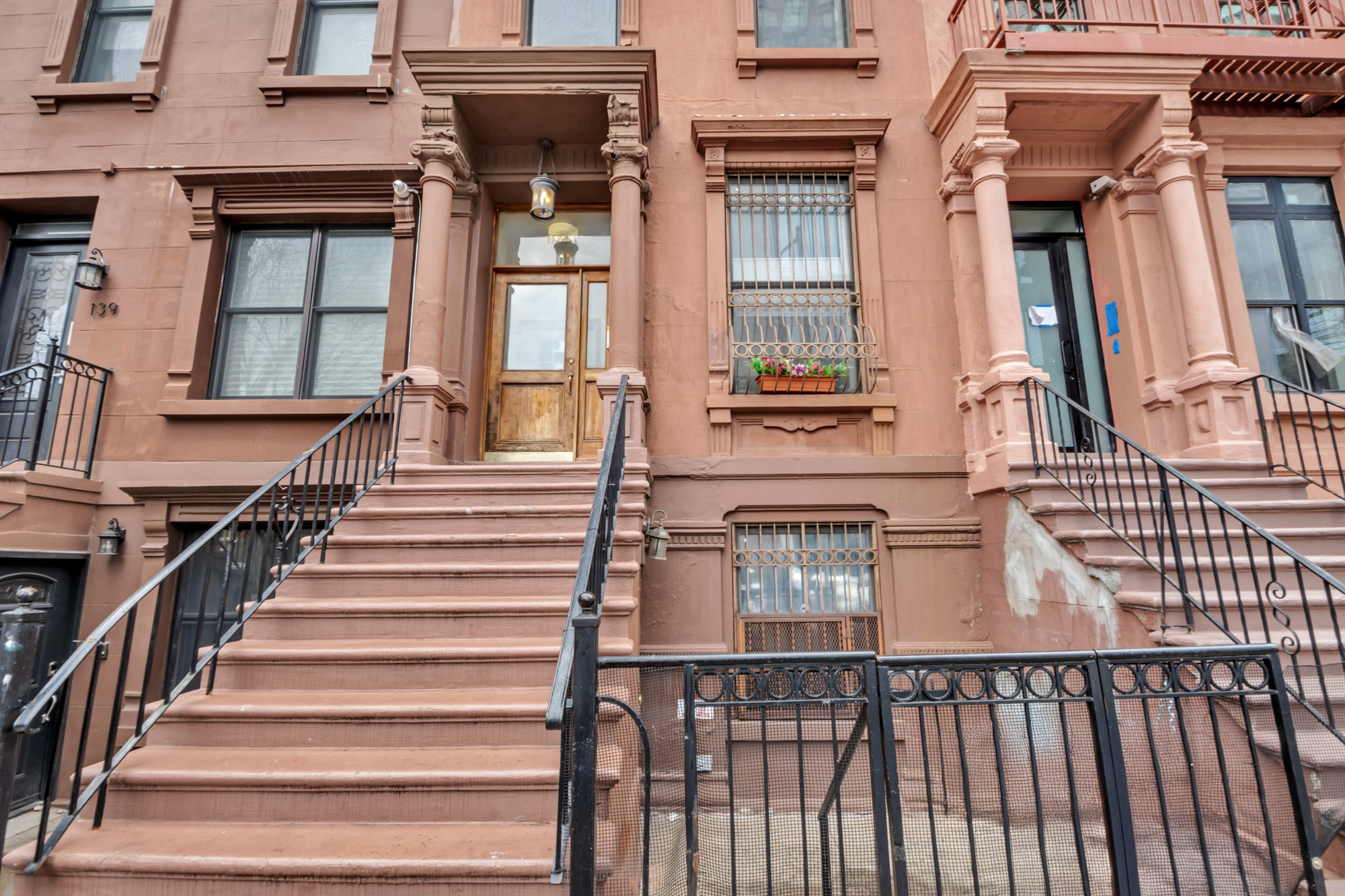 137 West 126th Street, Unit 1 Manhattan, NY 10027 - Photo 1 of 12 a view of a building with a window