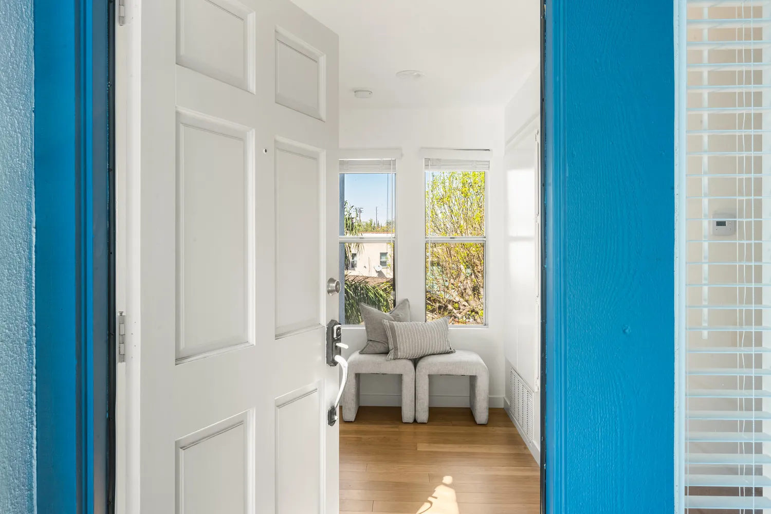 a view of an empty room with fire place