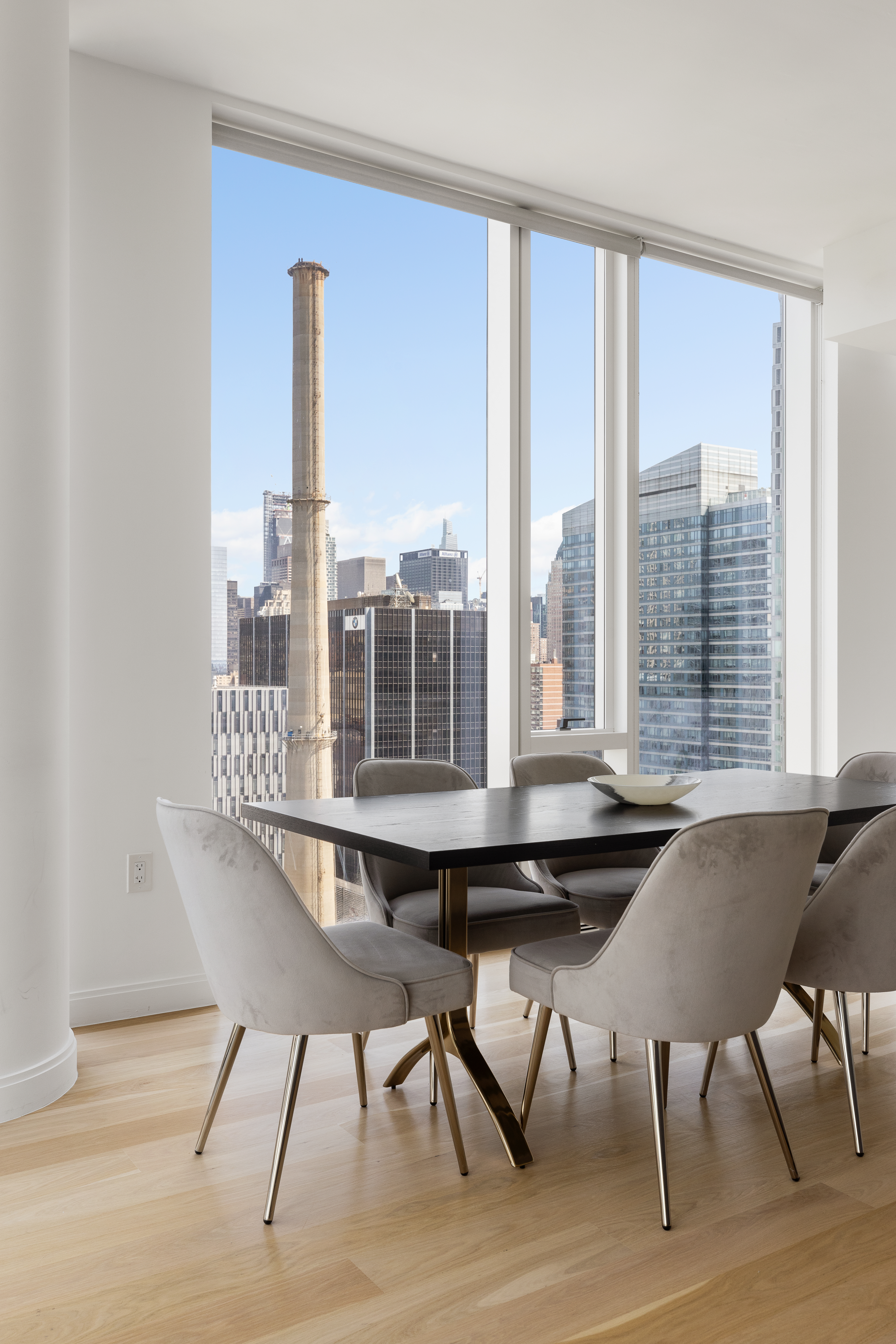 10 Riverside Boulevard, Unit 27D Manhattan, NY 10069 - Photo 4 of 21 a dining room with furniture and window