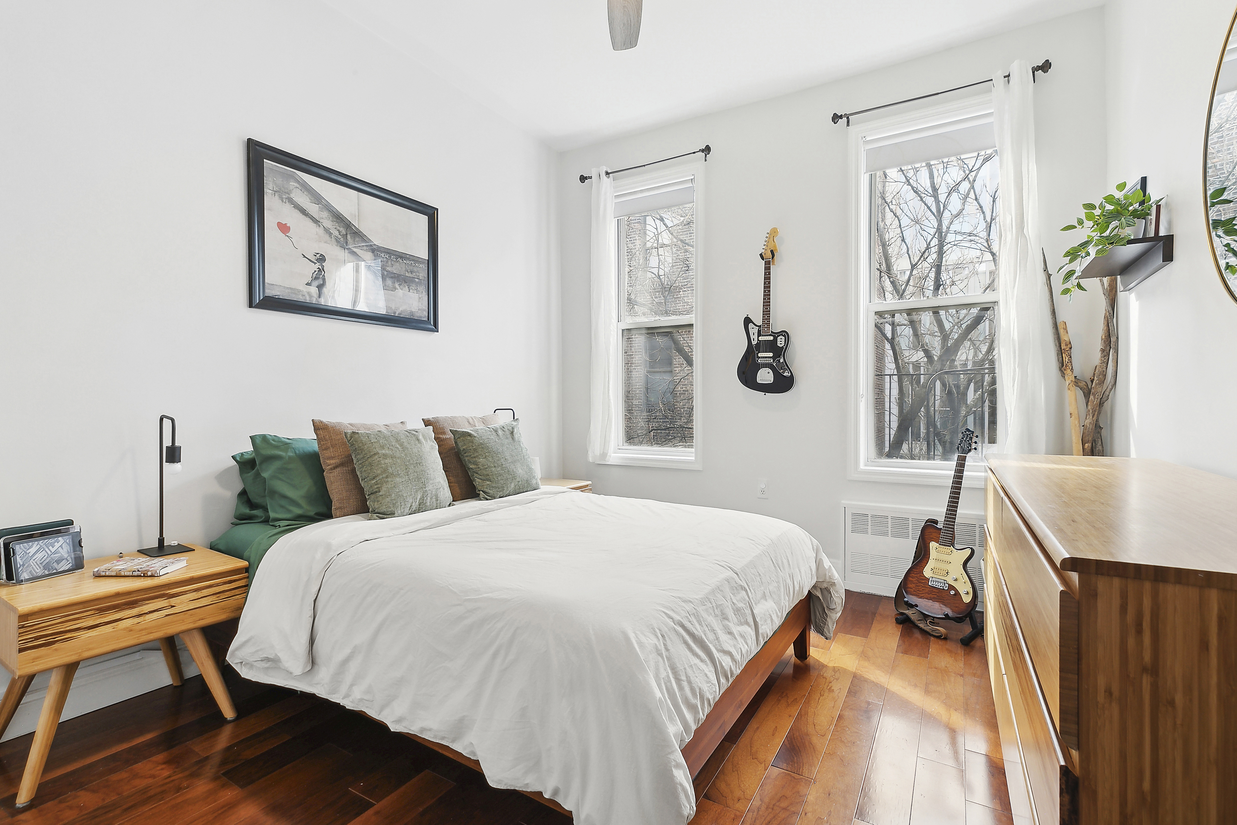 a bedroom with a bed and a table