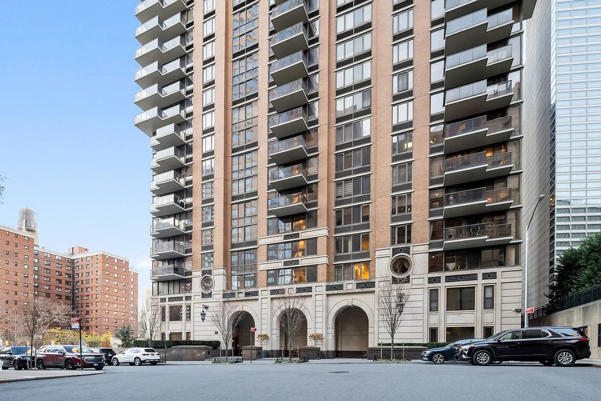 161 West 61st Street, Unit 19D Manhattan, NY 10023 - Photo 11 of 12 front view of a building with a street