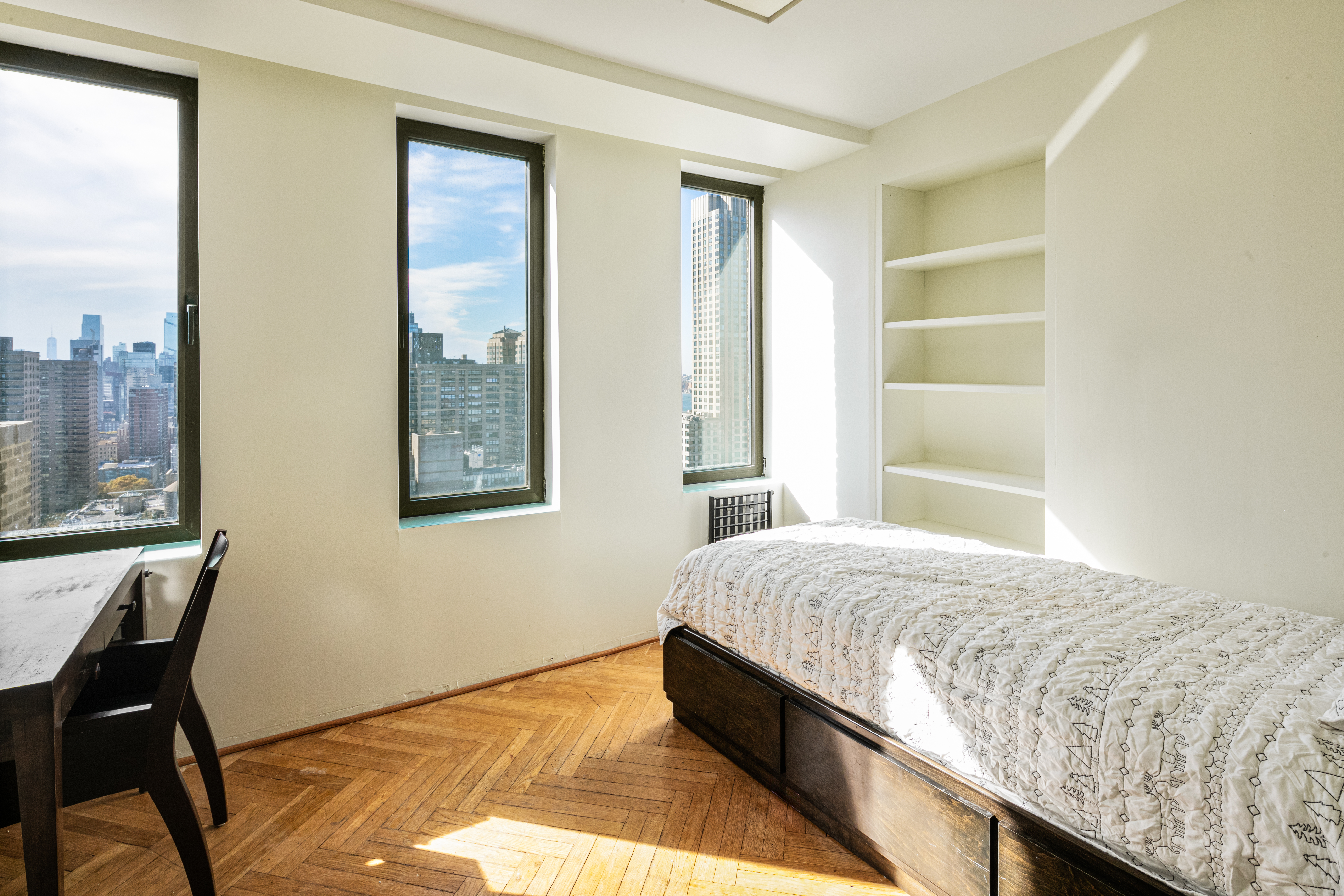 263 West End Avenue, Unit PH22B Manhattan, NY 10023 - Photo 17 of 19 a bedroom with a bed and a window