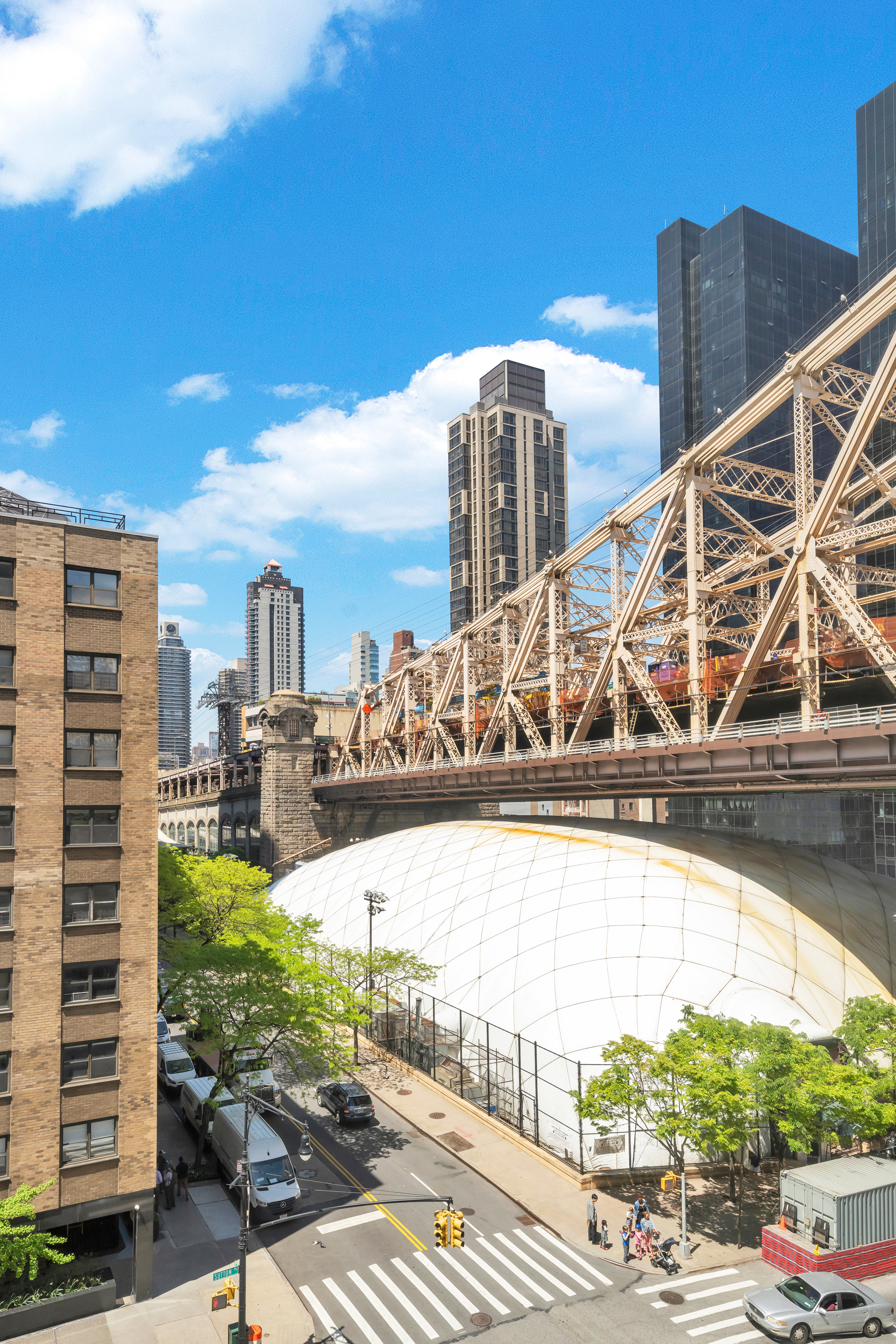 35 Sutton Place, Unit 7E Manhattan, NY 10022 - Photo 13 of 18 a view of swimming pool with outdoor seating and plants