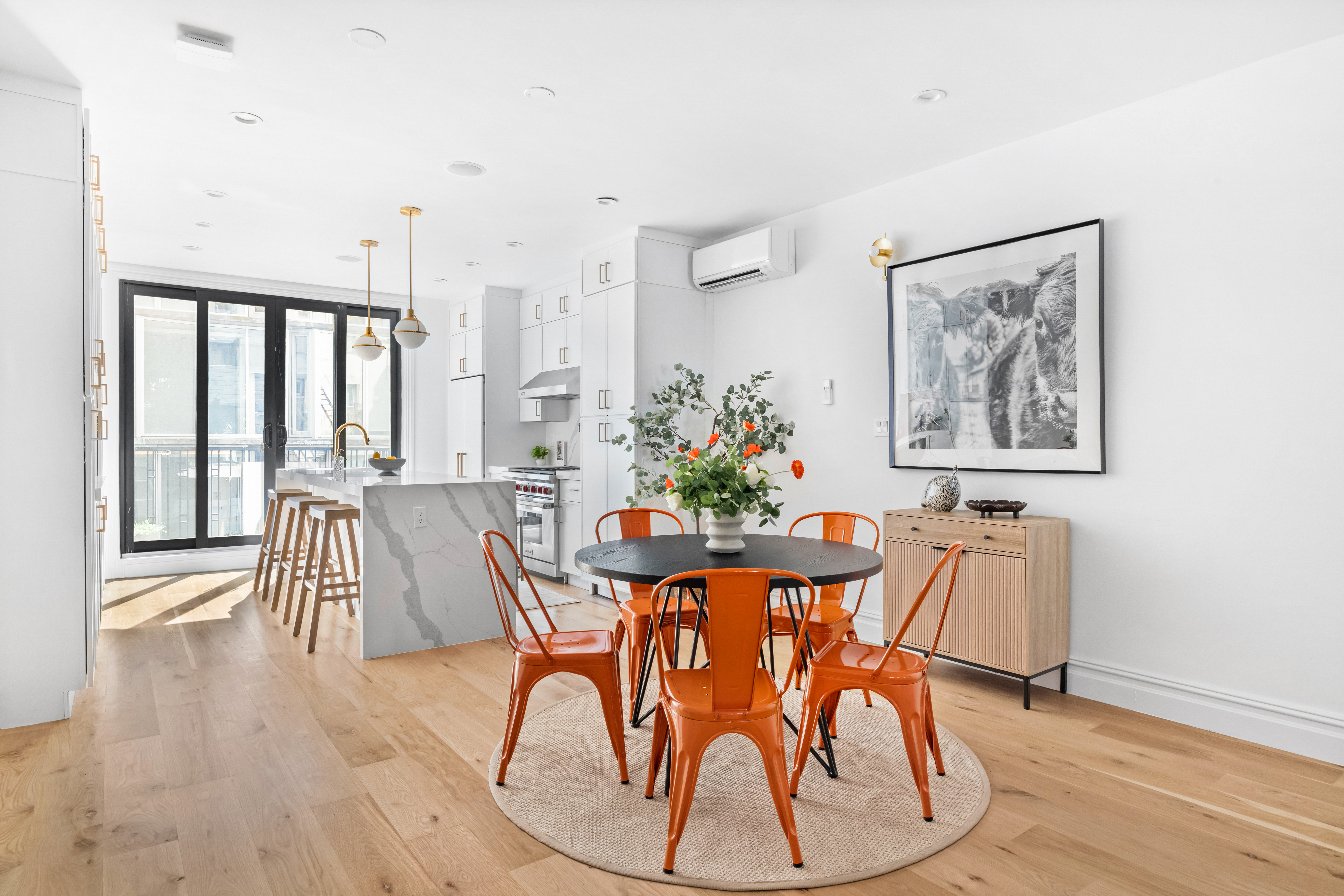 576 Carroll Street, Unit 2 Brooklyn, NY 11215 - Photo 3 of 15 a dining room with furniture and wooden floor