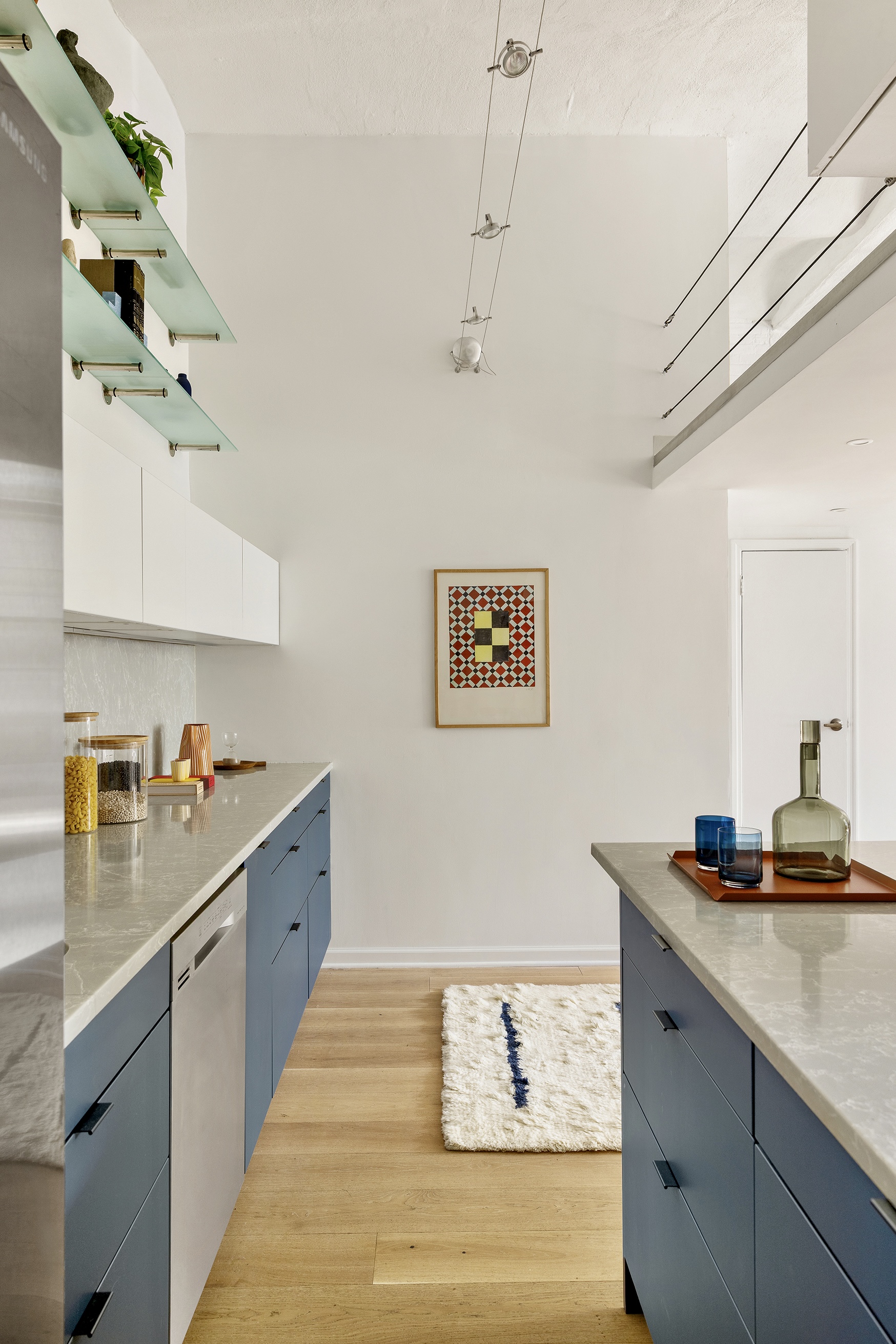 720 Greenwich Street, Unit 1F New York, NY 10014 - Photo 10 of 16 a kitchen with a sink and cabinets