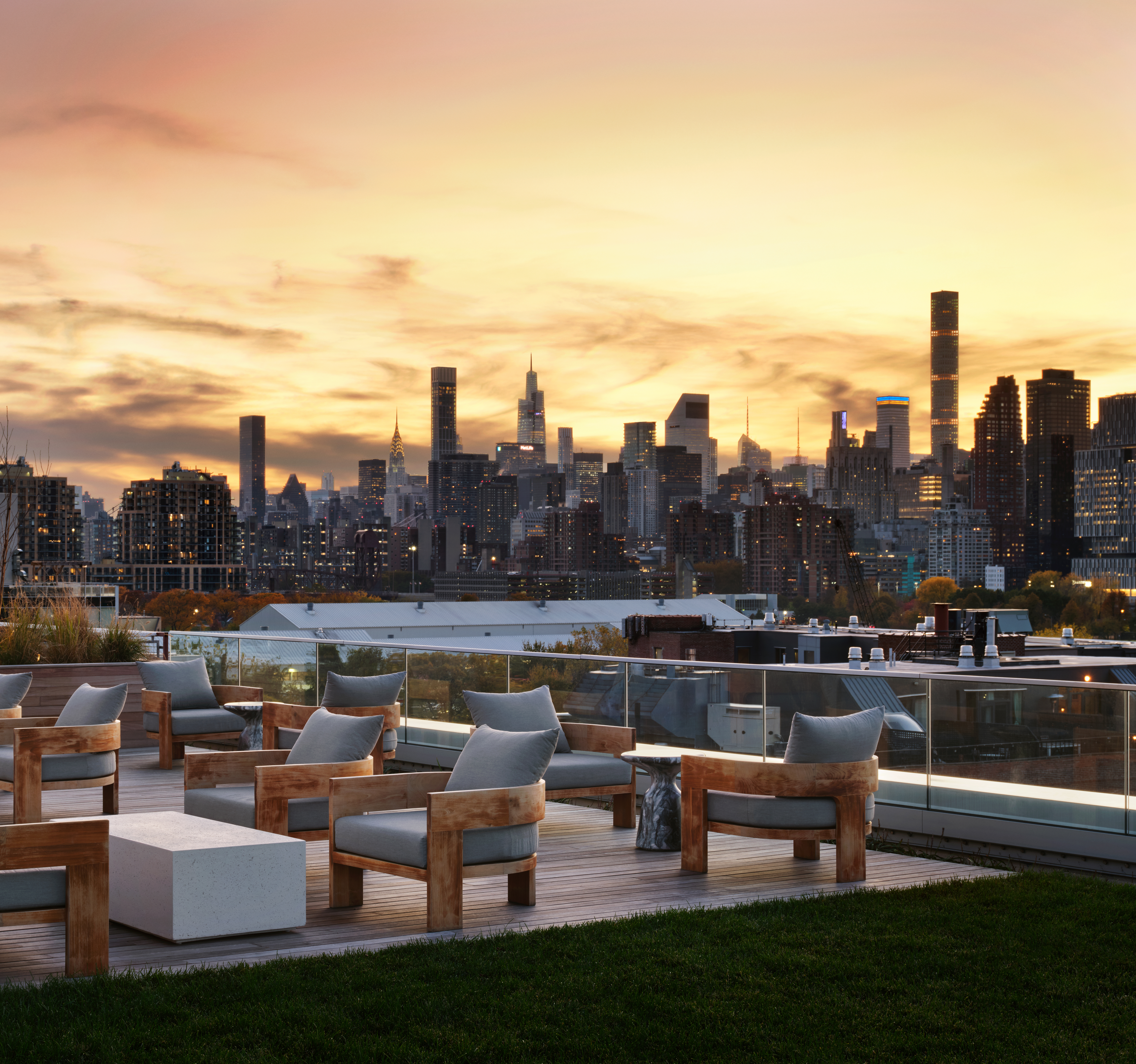 30-77 Vernon Boulevard, Unit PH811W Queens, NY 11102 - Photo 8 of 21 a view of a lake with couches and city view
