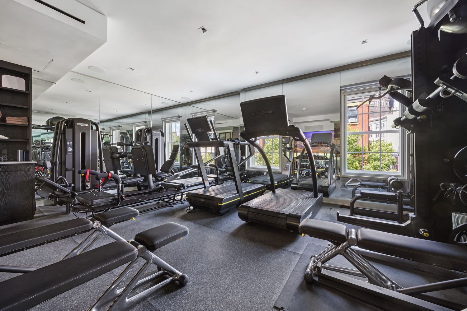 a bathroom with a sink toilet and a mirror