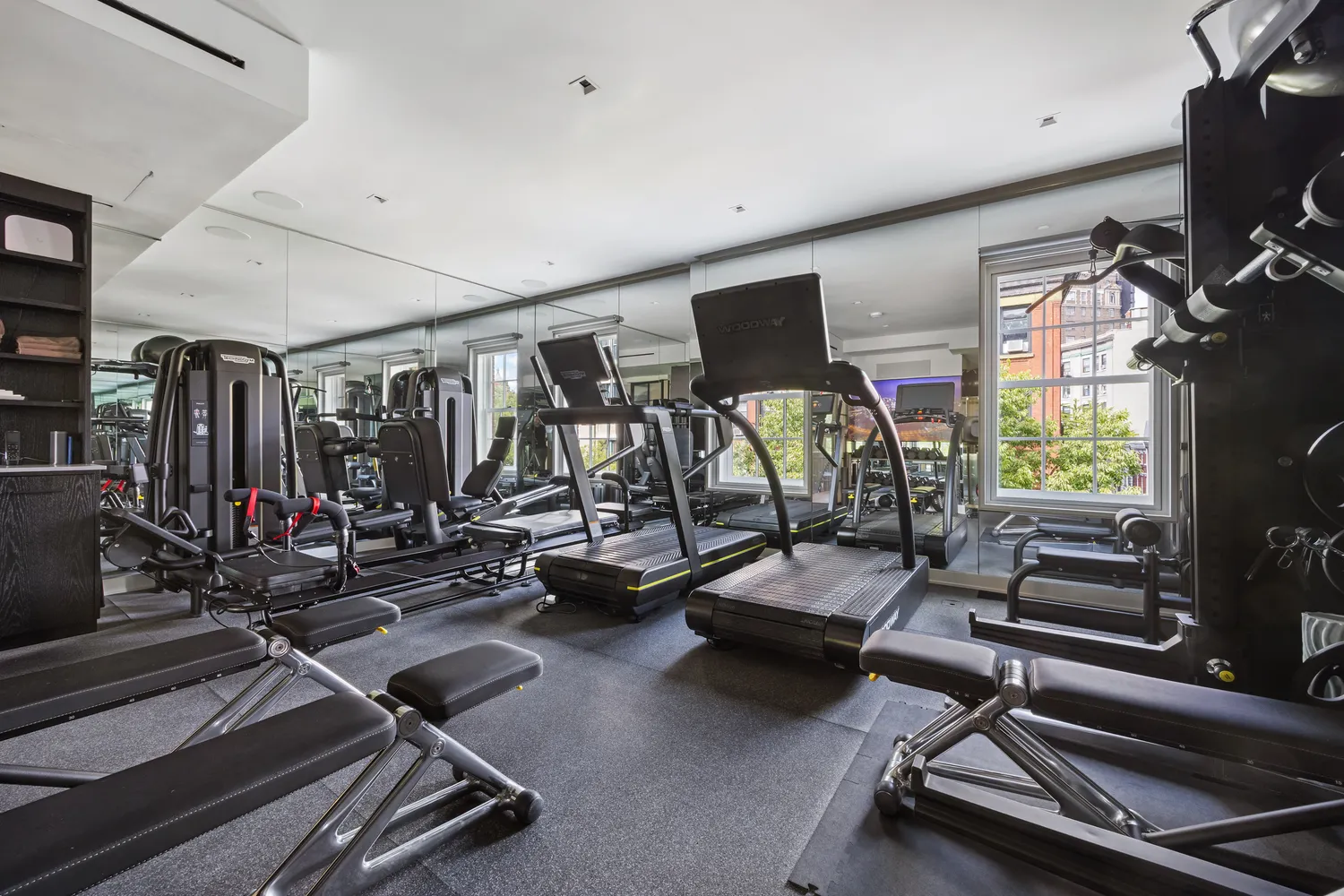 a bathroom with a sink toilet and a mirror