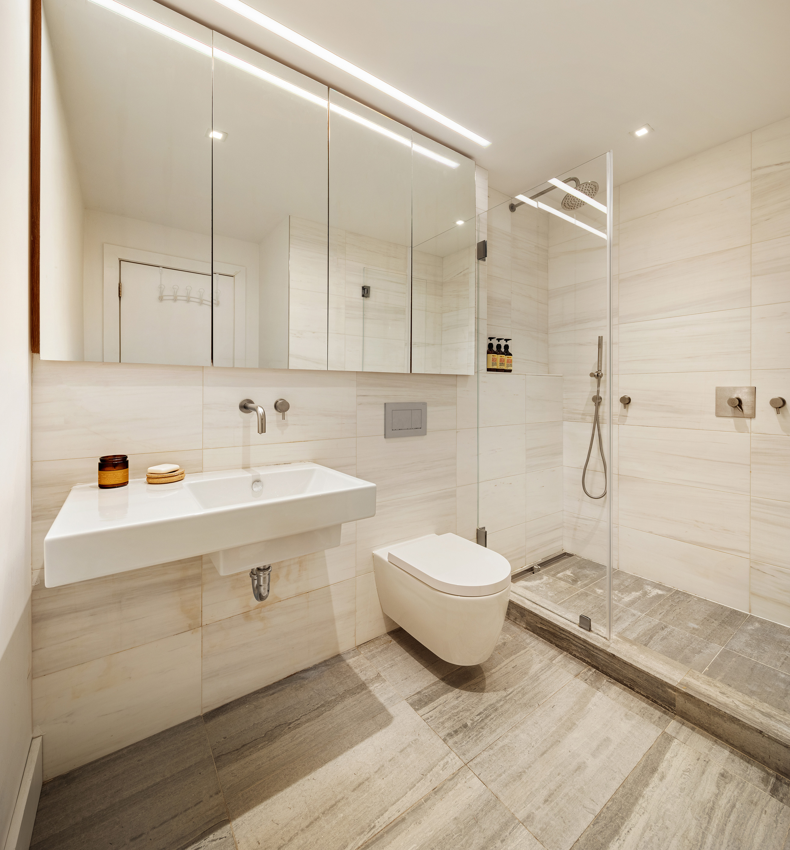 240 St Johns Place, Unit 1 Brooklyn, NY 11217 - Photo 7 of 13 a bathroom with a sink a toilet and shower