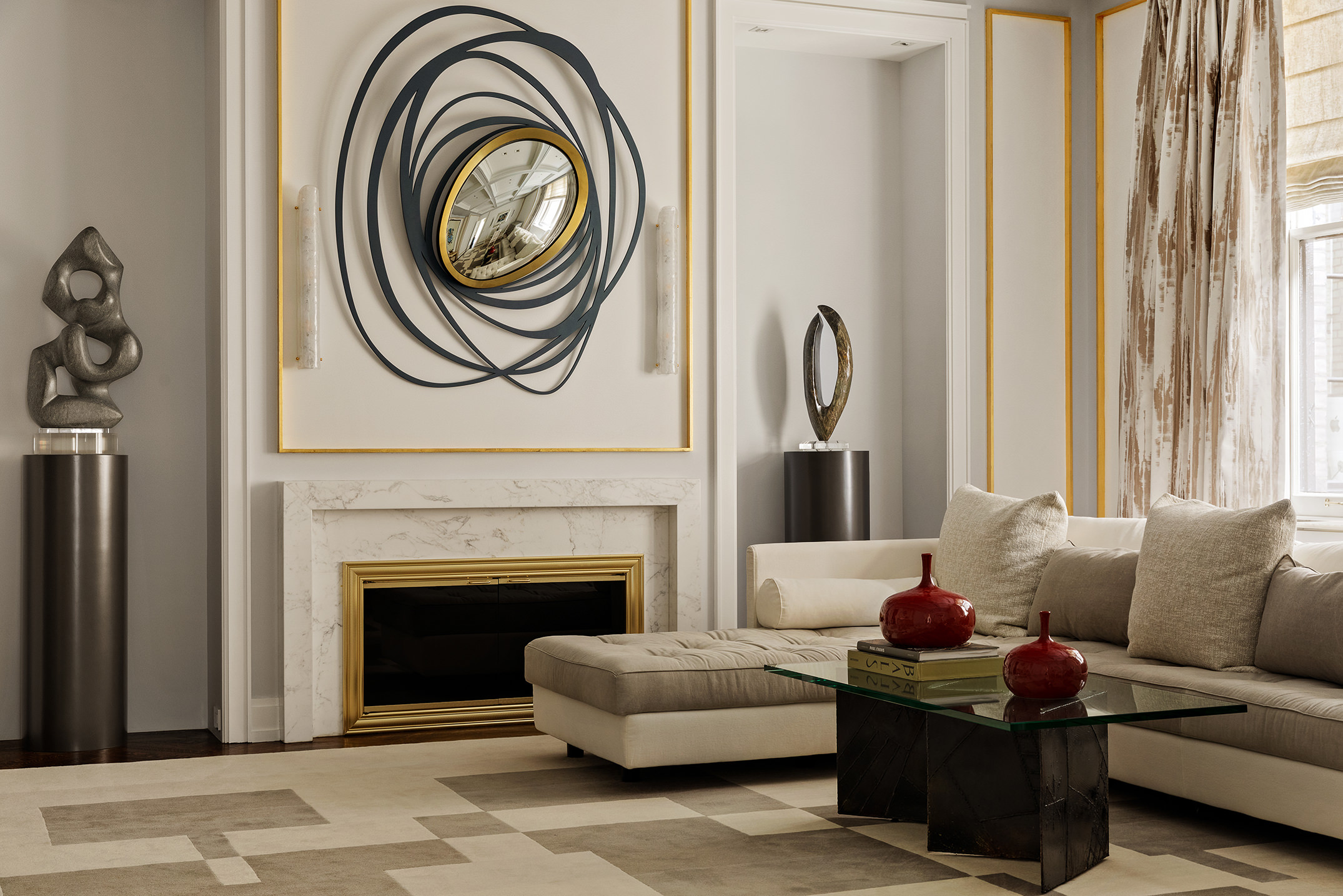 a living room with furniture and a fireplace