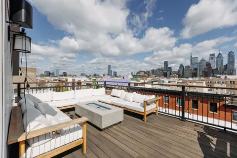 a view of a terrace with seating area