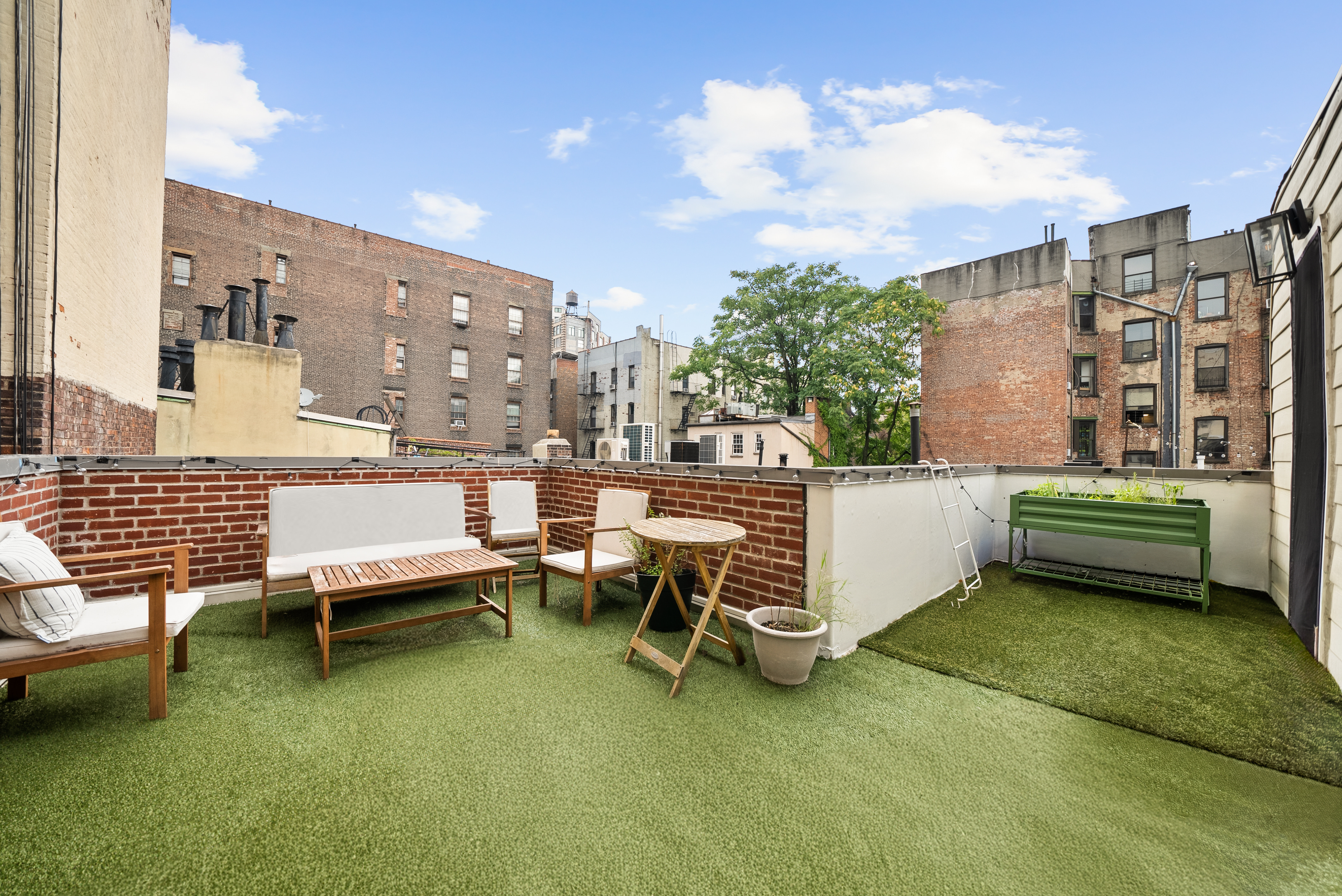 275 Bleecker Street, Unit 4 Manhattan, NY 10014 - Photo 10 of 10 a view of a terrace with sitting area
