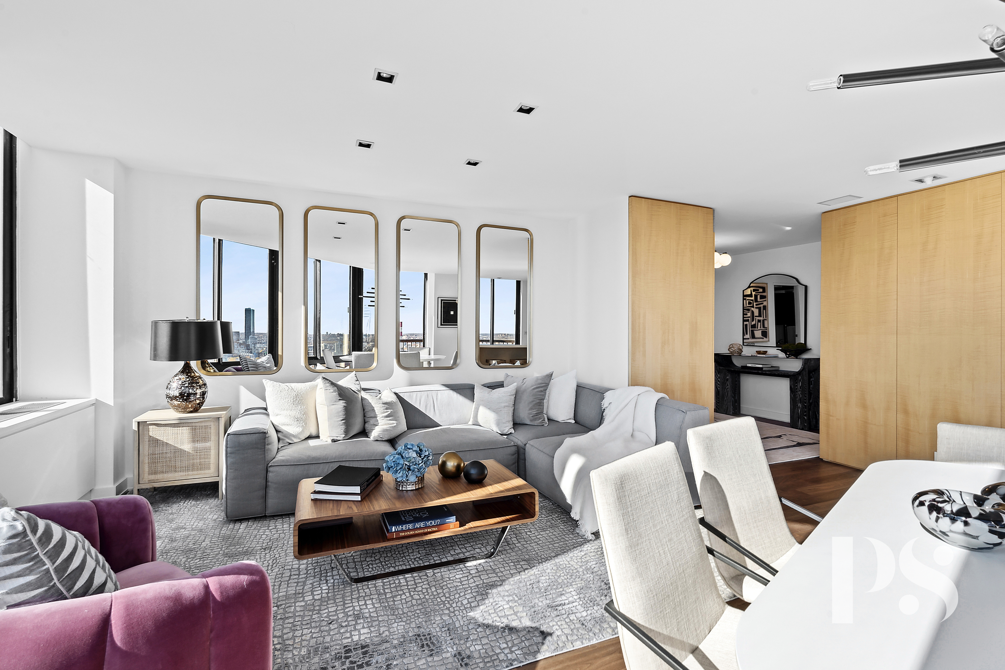 304 East 65th Street, Unit 39C Manhattan, NY 10065 - Photo 3 of 10 a living room with furniture fireplace and a window