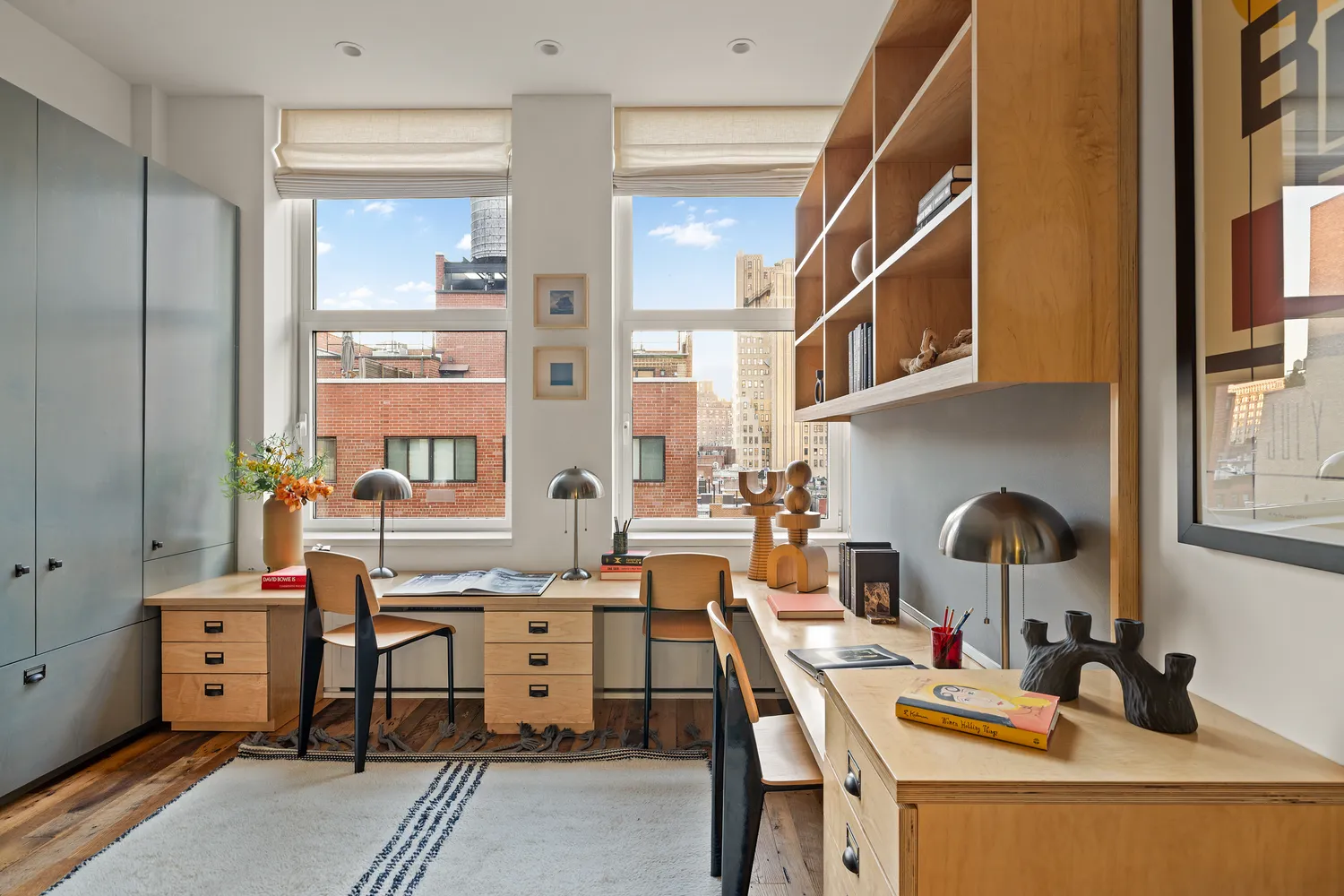 a workspace with furniture and window