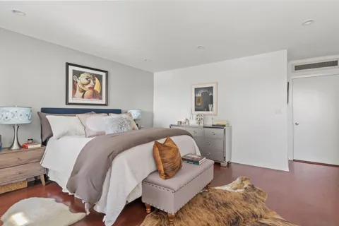 a bathroom with a sink mirror and vanity