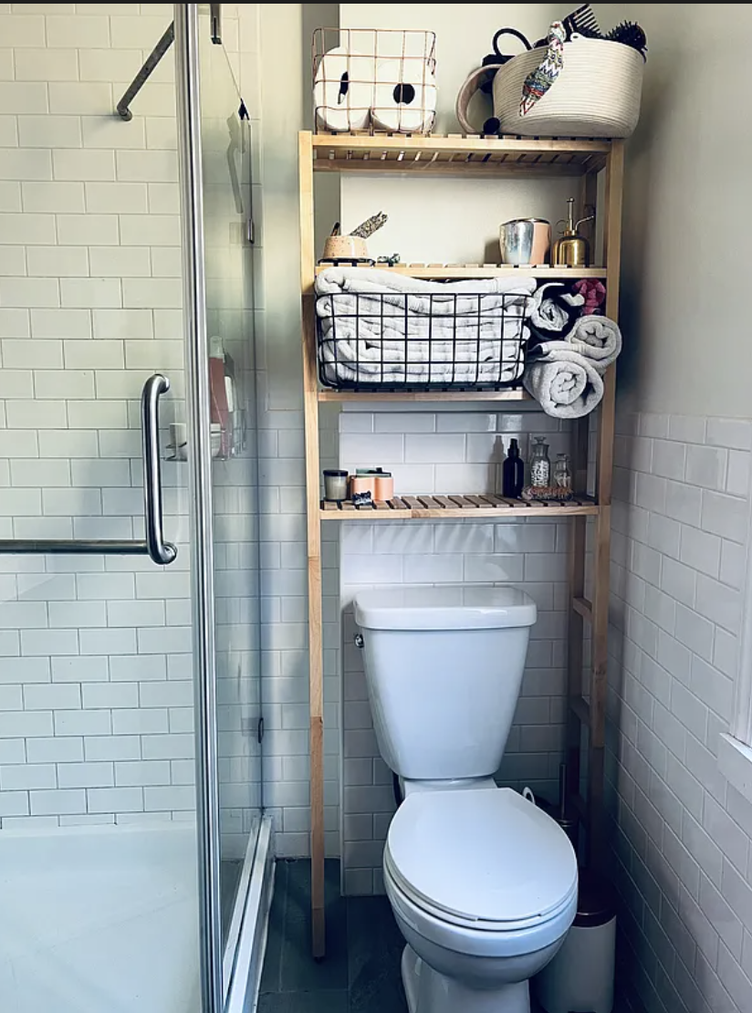 283 Devoe Street, Unit 3R Brooklyn, NY 11211 - Photo 9 of 10 a bathroom with a toilet a sink and a shower