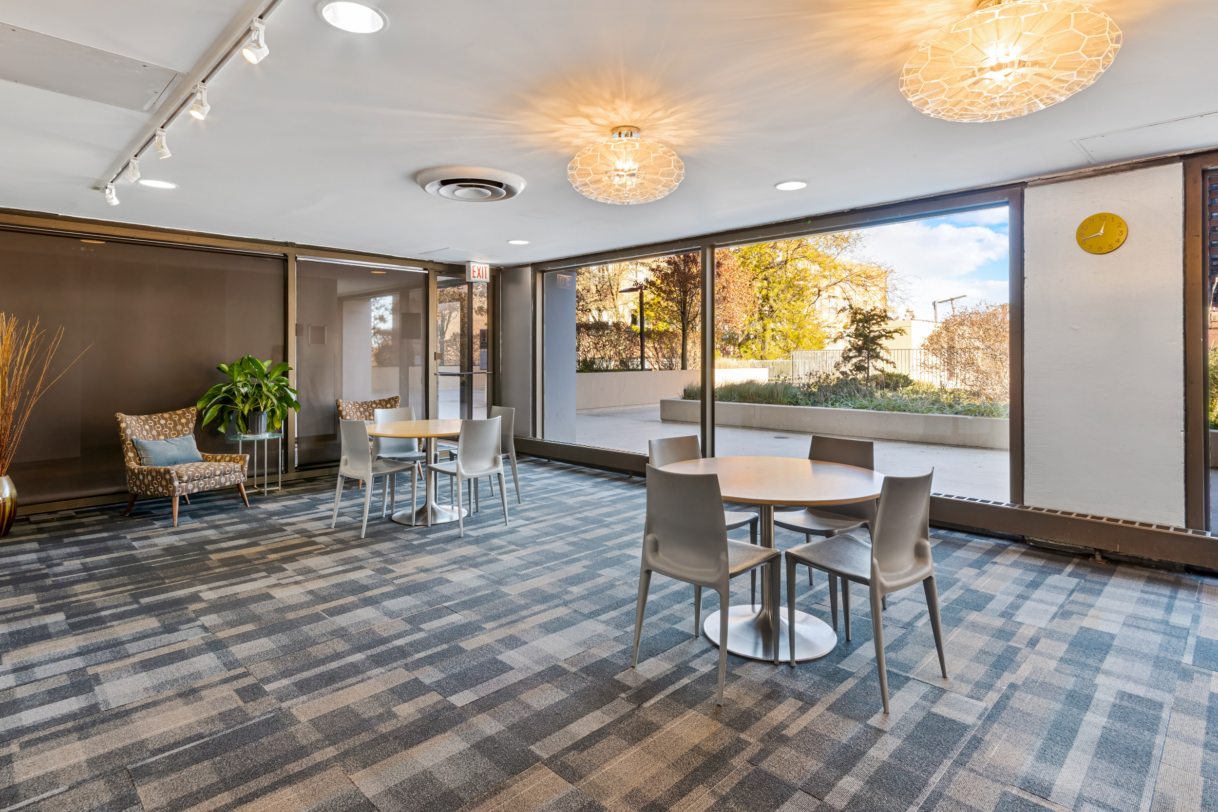 4343 North Clarendon Avenue, Unit 1016 Chicago, IL 60613 - Photo 29 of 35 a view of a dining room with furniture window and outside view