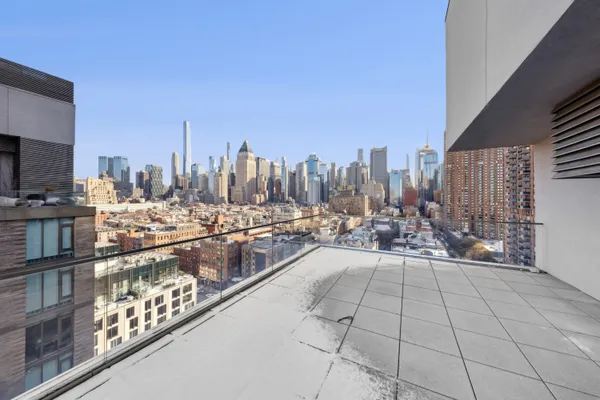 a view of a terrace with seating area