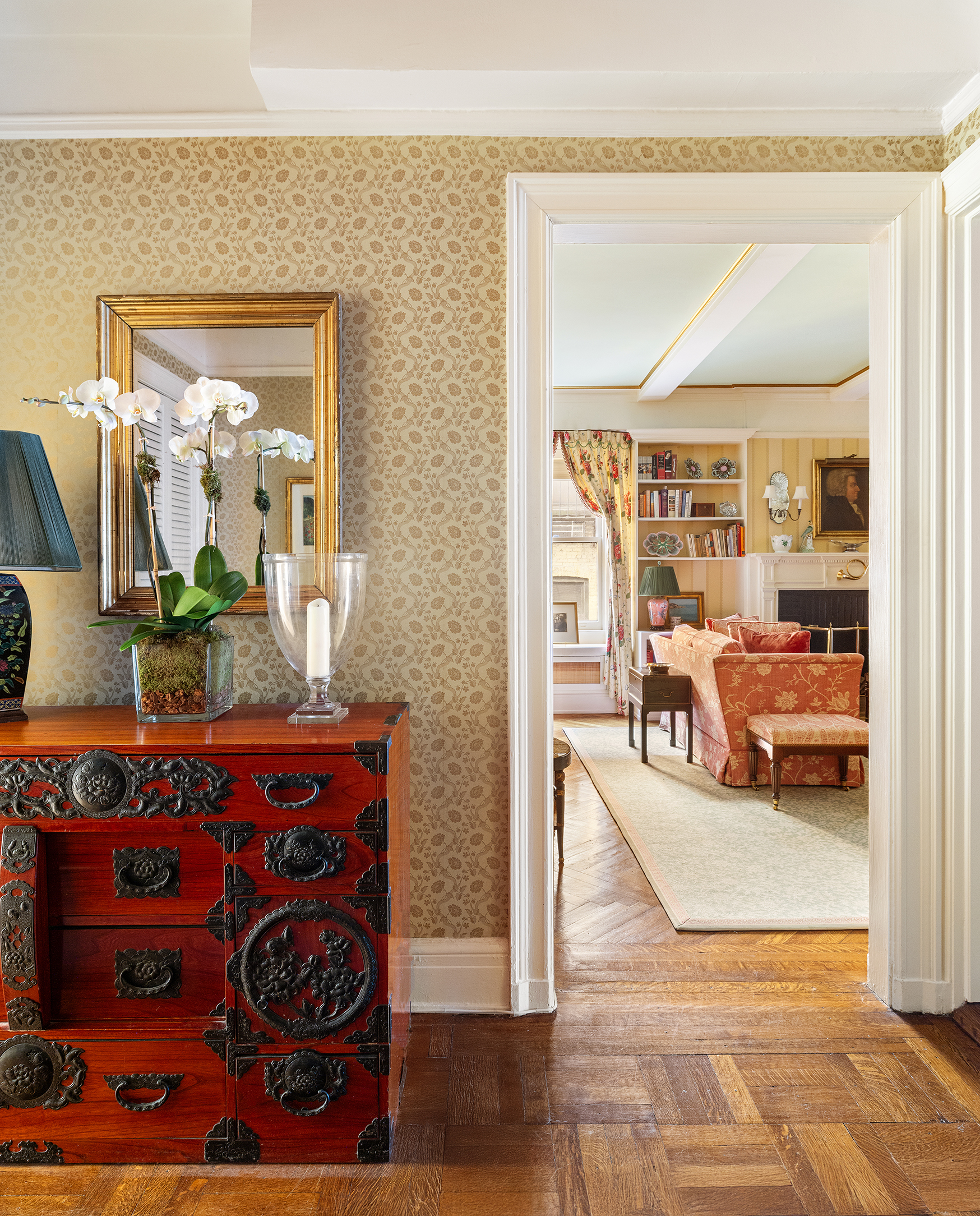 70 East 77th Street, Unit 6A Manhattan, NY 10075 - Photo 9 of 17 a living room with furniture and a painting on the wall