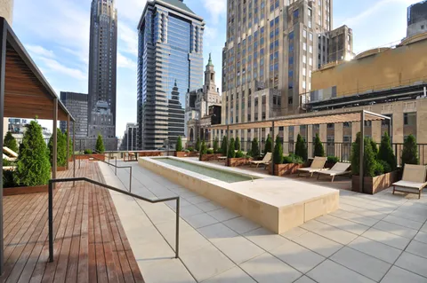 a view of a building with sitting area