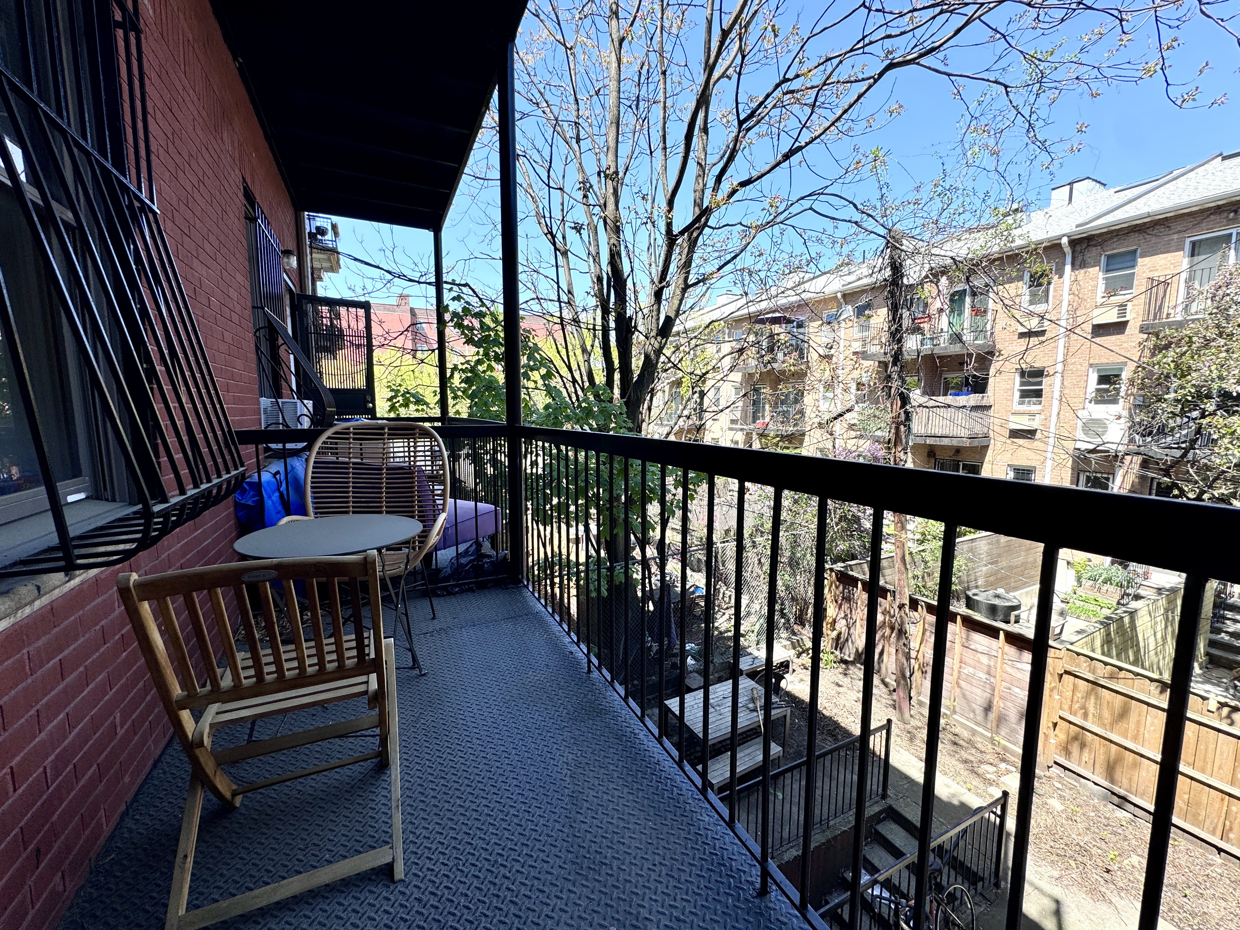 379 Baltic Street, Unit Undisclosed Brooklyn, NY 11201 - Photo 1 of 10 a view of a chairs on the roof deck