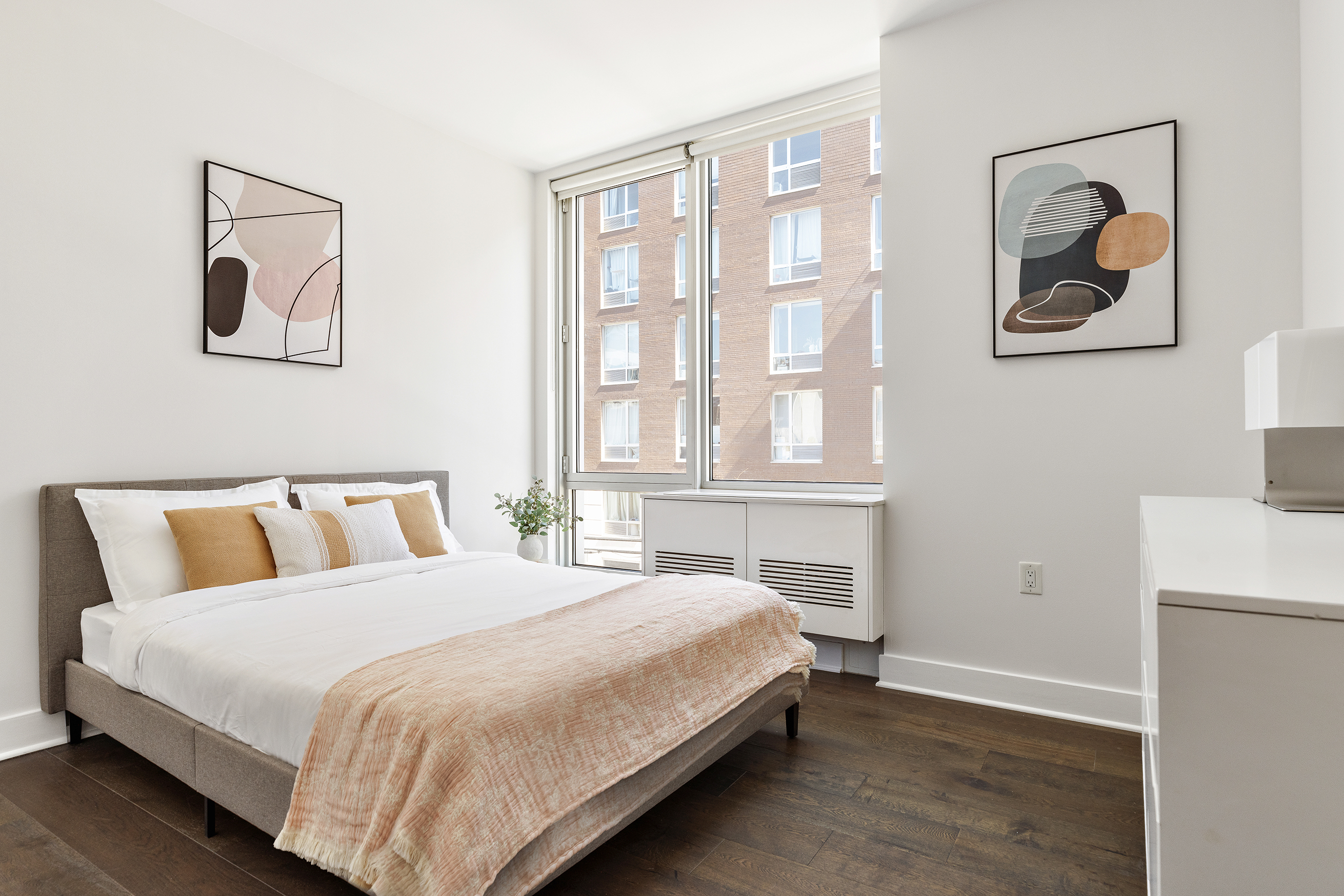 212 North 9th Street, Unit 3C Brooklyn, NY 11211 - Photo 7 of 16 a bedroom with a bed and a painting on the wall