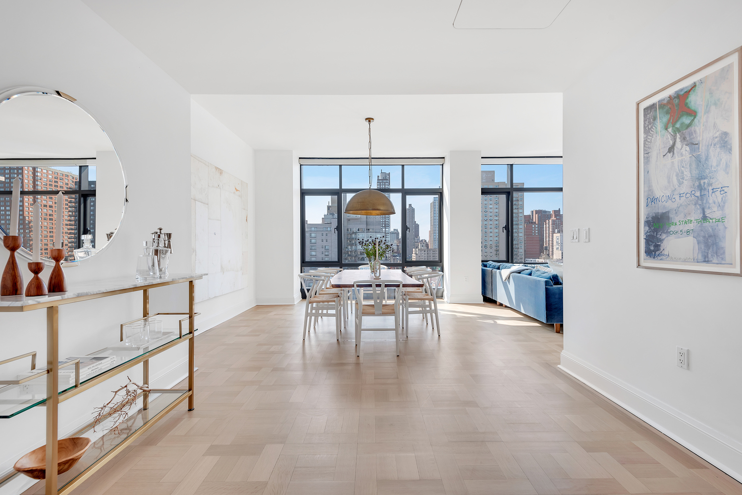 170 East End Avenue, Unit 16B Manhattan, NY 10128 - Photo 5 of 21 a view of a livingroom with furniture a flat screen tv and a window