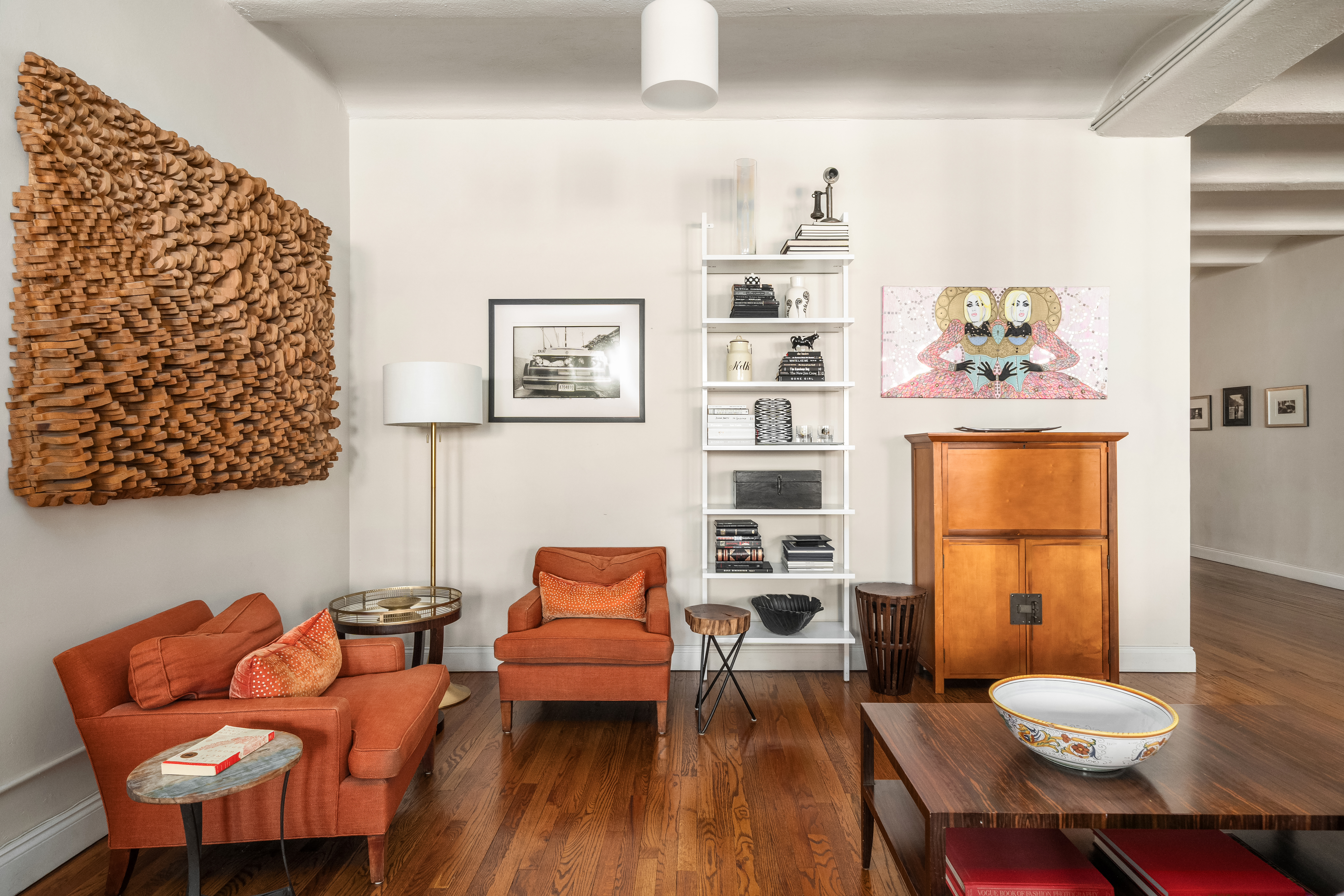 20-26 North Moore Street, Unit 4W Manhattan, NY 10013 - Photo 7 of 24 a living room with furniture and wooden floor