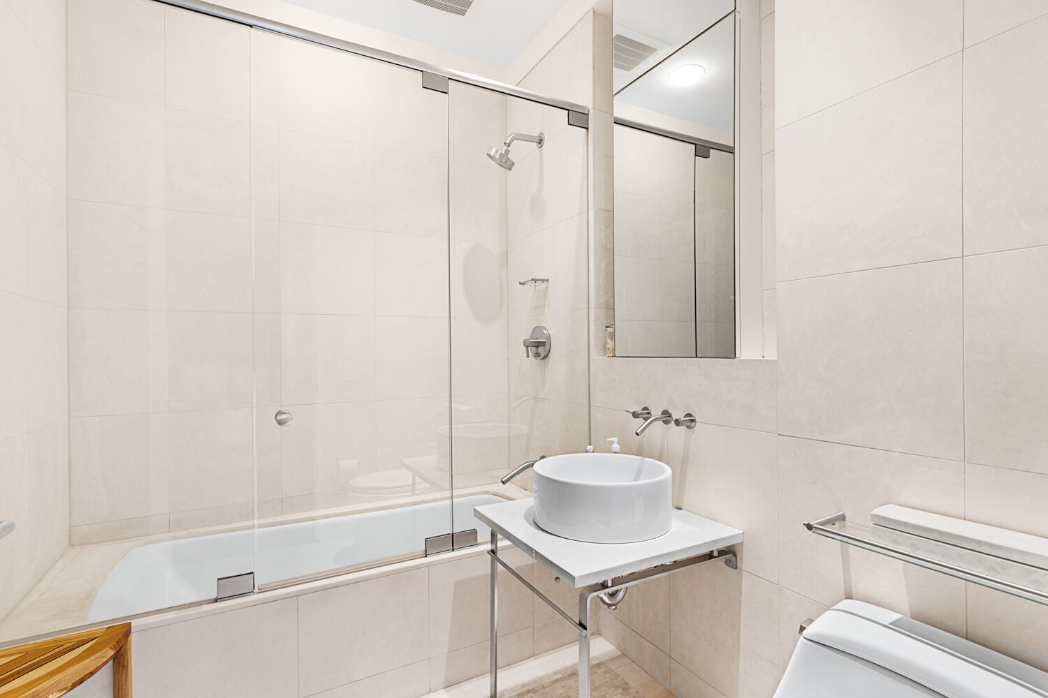 52 Thomas Street, Unit 2B Manhattan, NY 10013 - Photo 7 of 9 a bathroom with a sink and a mirror