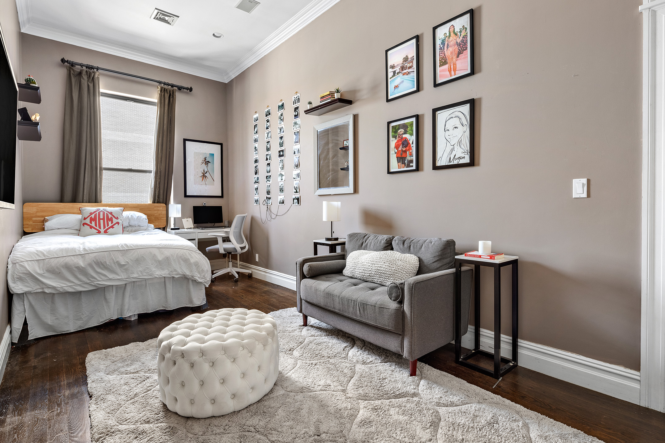 733 9th Avenue, Unit 5 Manhattan, NY 10019 - Photo 5 of 9 a bedroom with bed and a couch