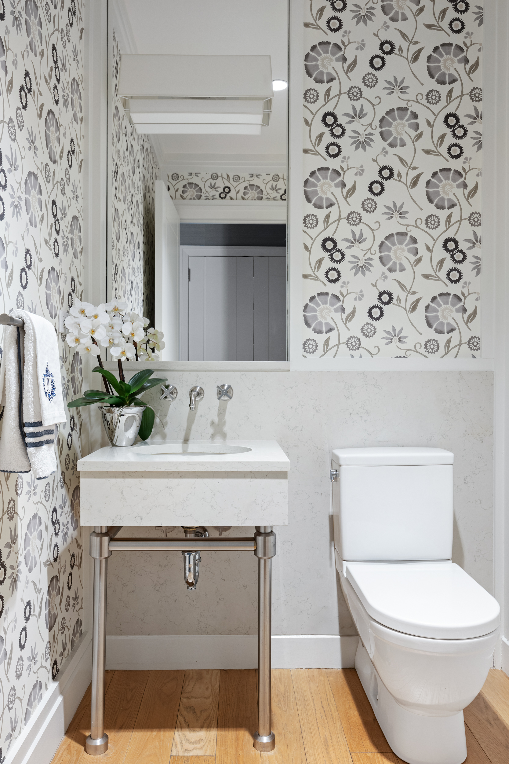 71 Laight Street, Unit 2F Manhattan, NY 10013 - Photo 14 of 20 a bathroom with a sink a toilet and mirror