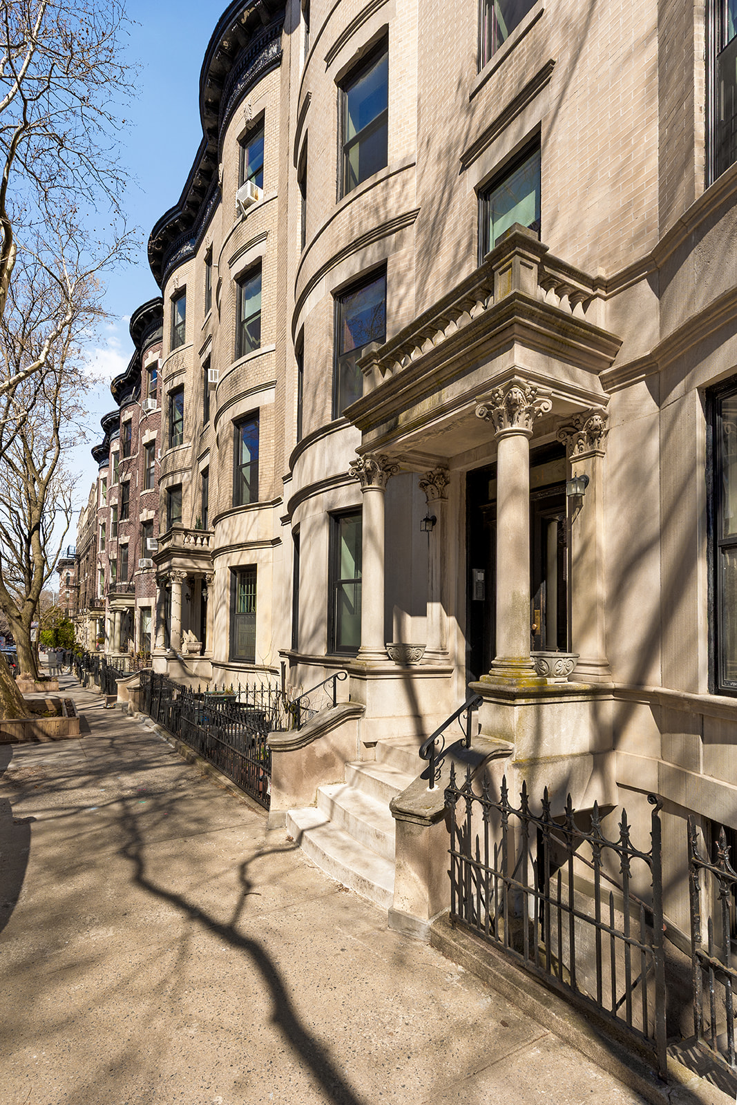 551 4th Street, Unit 1L Brooklyn, NY 11215 - Photo 16 of 17 a view of a building with a on a bench