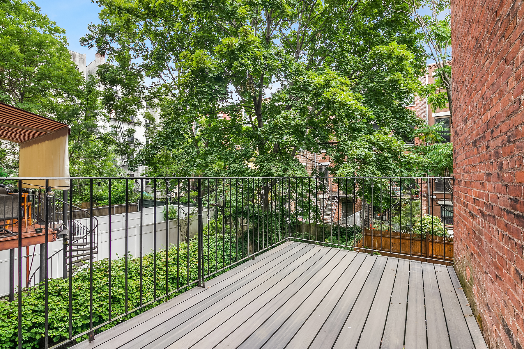 357 West 120th Street, Unit 1R Manhattan, NY 10027 - Photo 8 of 9 a view of balcony with wooden floor