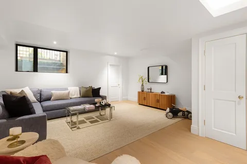 a living room with furniture and a couch