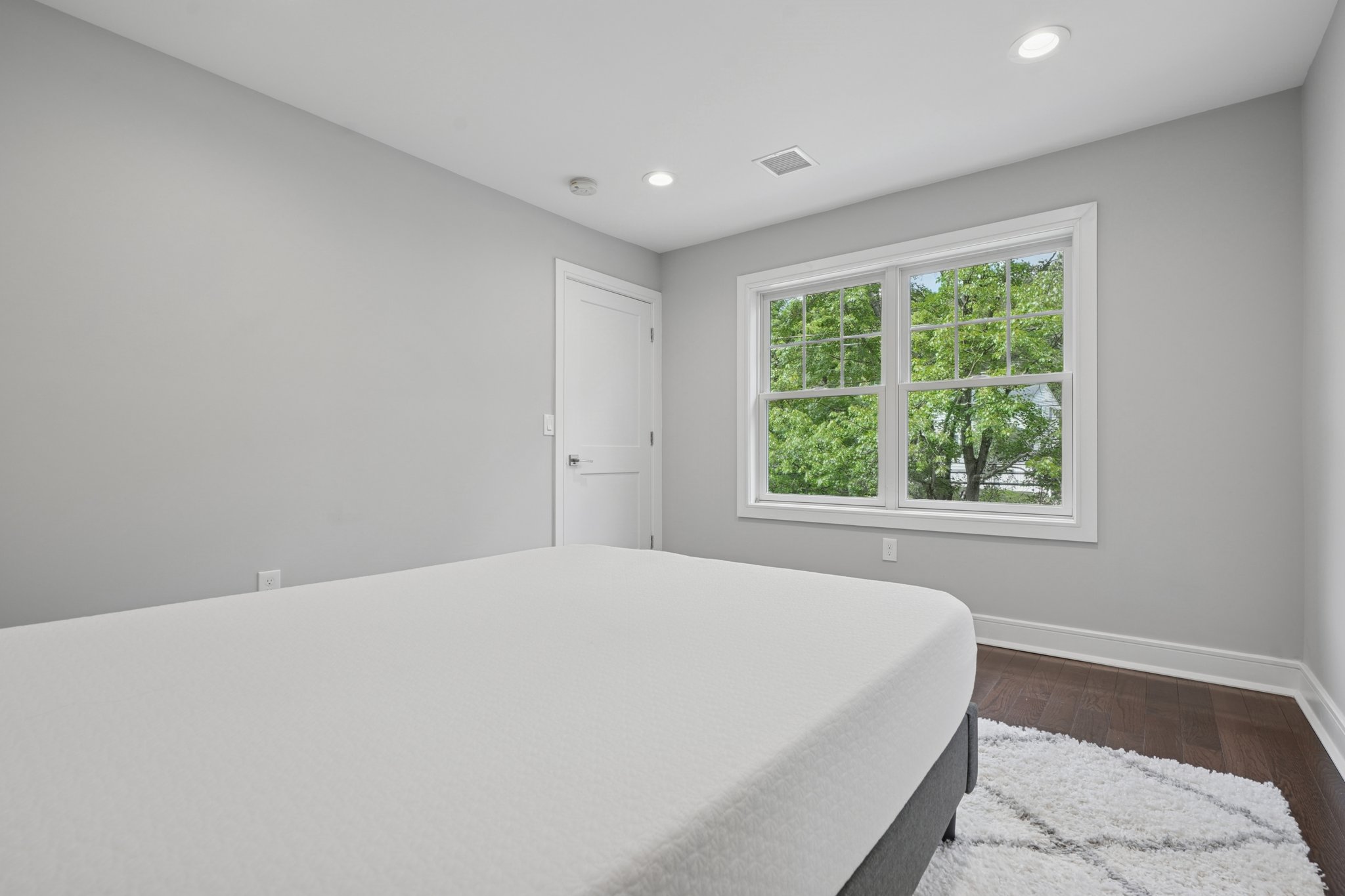 823 River Road Chatham, NJ 07928 - Photo 25 of 60 a bedroom with a bed and a window