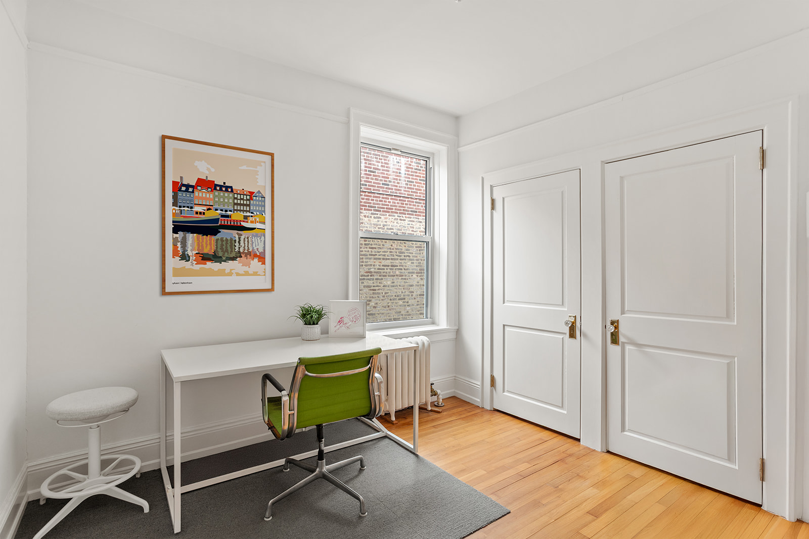 34-43 82nd Street, Unit 51 Queens, NY 11372 - Photo 6 of 12 a living room with furniture and a window