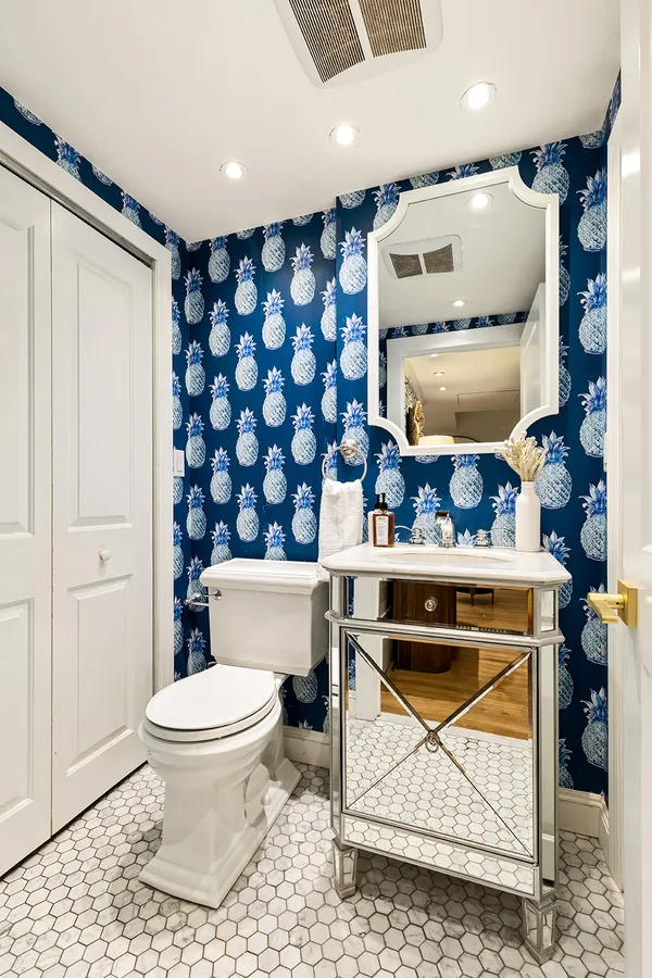 a bathroom with a toilet and a sink