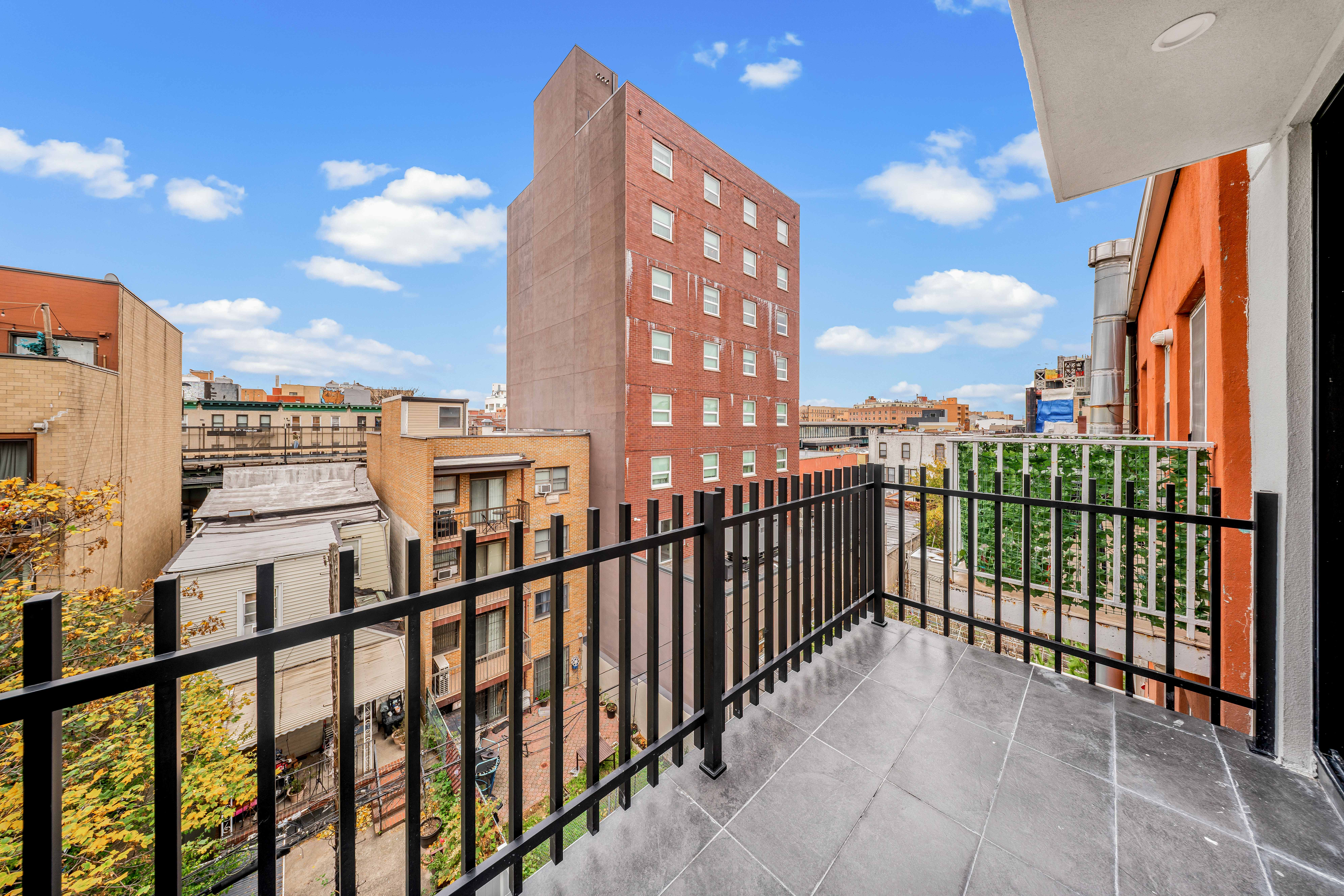30-24 32nd Street, Unit 4A Queens, NY 11102 - Photo 18 of 22 a view of city from a balcony