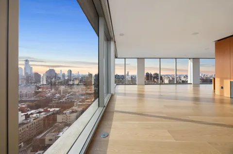 a view of outdoor space with a large window