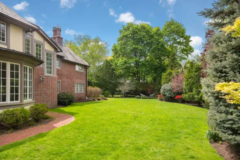 a view of a back yard of the house