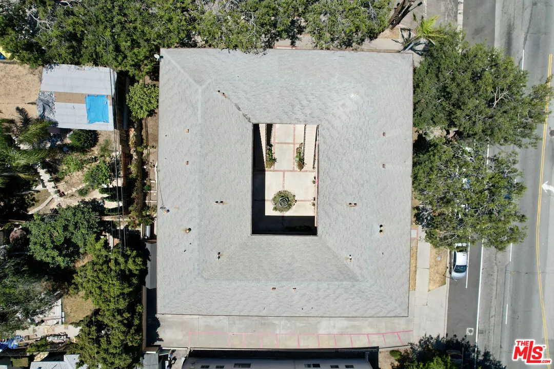11150 Regent Street Los Angeles, CA 90034 - Photo 15 of 16 an aerial view of a house with a yard and potted plants